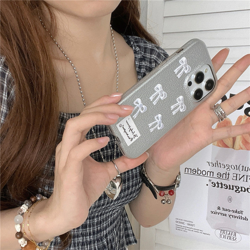 Simple Silver Leather iPhone 15 Pro Max Case – Elegant Bow Design Protective Cover - HZ Mobile